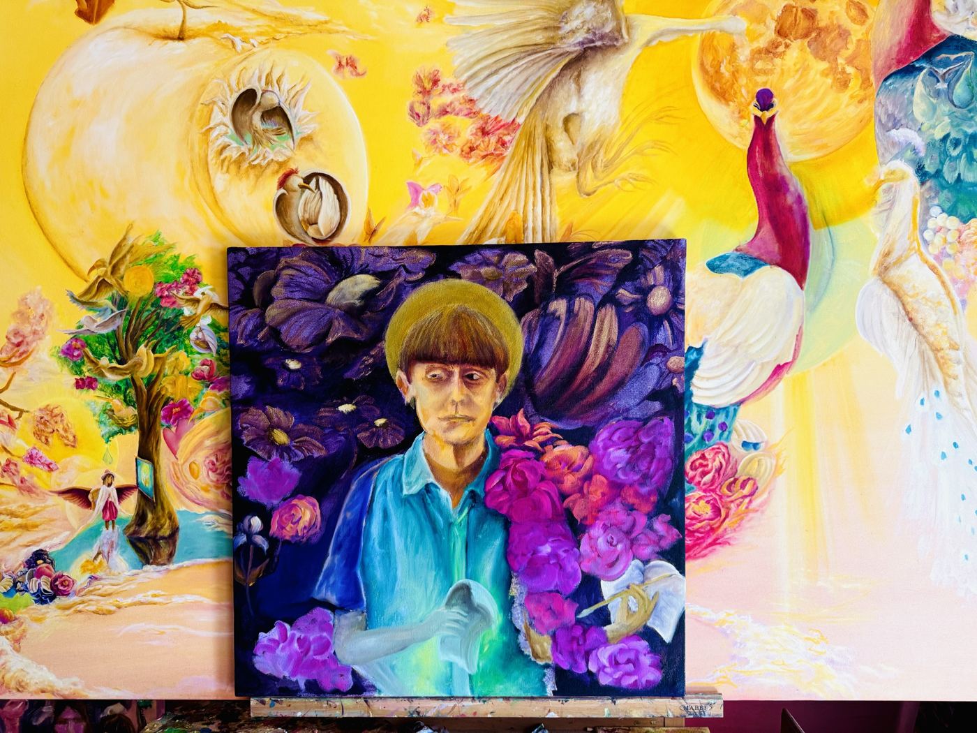 Portrait among purple flowers set within a larger bright yellow painting